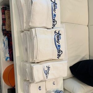 White Embroidered Towels with Blue Logo. Large set!!  Great condition